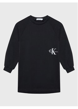 Calvin Klein Jeans Sukienka dzianinowa Monogram Off Placed IG0IG01567 Czarny Regular Fit ze sklepu MODIVO w kategorii Sukienki dziewczęce - zdjęcie 168669421