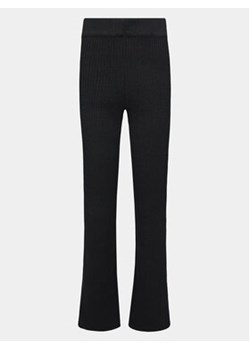 Outhorn Spodnie dresowe OTHAW23TTROF492 Czarny Regular Fit ze sklepu MODIVO w kategorii Spodnie damskie - zdjęcie 168672710