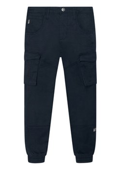 NAME IT Spodnie materiałowe Bamgo 13151735 Granatowy Regular Fit ze sklepu MODIVO w kategorii Spodnie chłopięce - zdjęcie 168672803
