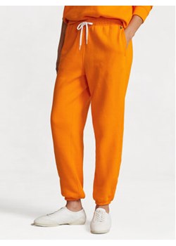 Polo Ralph Lauren Spodnie dresowe Prl Flc Pnt 211943009007 Pomarańczowy Regular Fit ze sklepu MODIVO w kategorii Spodnie damskie - zdjęcie 168674360