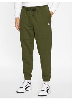 Puma Spodnie dresowe Downtown 621287 Zielony Regular Fit ze sklepu MODIVO w kategorii Spodnie męskie - zdjęcie 168678543