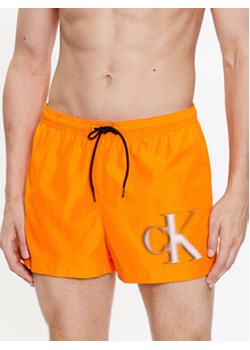 Calvin Klein Swimwear Szorty kąpielowe KM0KM00801 Pomarańczowy Regular Fit ze sklepu MODIVO w kategorii Kąpielówki - zdjęcie 168680621