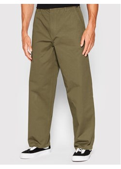 Vans Spodnie materiałowe Authentic Chino VN000005 Brązowy Baggy Fit ze sklepu MODIVO w kategorii Spodnie męskie - zdjęcie 168683420