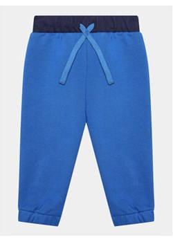 United Colors Of Benetton Spodnie dresowe 3PANGF02R Niebieski Regular Fit ze sklepu MODIVO w kategorii Spodnie chłopięce - zdjęcie 168687984