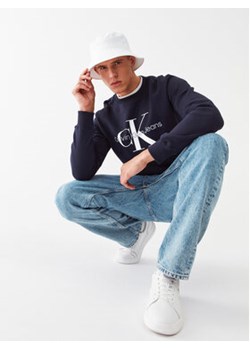 Calvin Klein Jeans Bluza J30J320933 Granatowy Regular Fit ze sklepu MODIVO w kategorii Bluzy męskie - zdjęcie 168692443