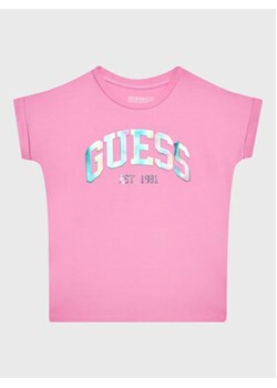 Guess T-Shirt J3RI33 K6YW1 Różowy Regular Fit ze sklepu MODIVO w kategorii Bluzki dziewczęce - zdjęcie 168754484