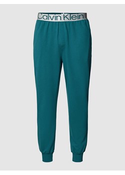 Spodnie od piżamy z elastycznym paskiem z logo ze sklepu Peek&Cloppenburg  w kategorii Piżamy męskie - zdjęcie 168776373