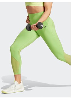 adidas Legginsy Tailored HIIT Training 7/8 Leggings IK4247 Zielony ze sklepu MODIVO w kategorii Spodnie damskie - zdjęcie 168792613