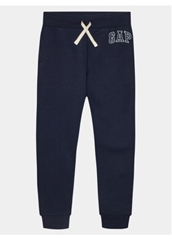 Gap Spodnie dresowe 550068-01 Granatowy Regular Fit ze sklepu MODIVO w kategorii Spodnie chłopięce - zdjęcie 168794492