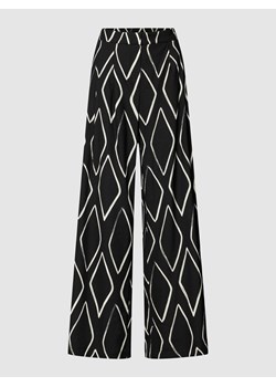 Spodnie materiałowe o luźnym kroju z mieszanki wiskozy ze wzorem na całej powierzchni ze sklepu Peek&Cloppenburg  w kategorii Spodnie damskie - zdjęcie 168963003