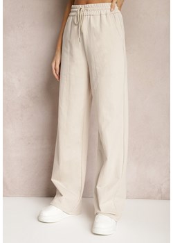 Jasnobeżowe Szerokie Spodnie Dresowe z Elastycznej Bawełny Niarti ze sklepu Renee odzież w kategorii Spodnie damskie - zdjęcie 168988403