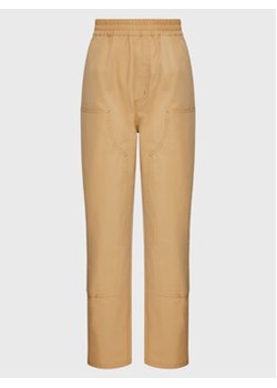 Carhartt WIP Spodnie materiałowe Unisex Montana I030622 Beżowy Regular Fit ze sklepu MODIVO w kategorii Spodnie damskie - zdjęcie 169056813