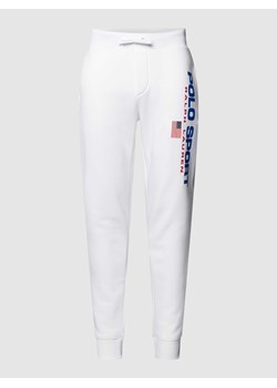 Spodnie dresowe z nadrukiem z logo ze sklepu Peek&Cloppenburg  w kategorii Spodnie męskie - zdjęcie 169122931