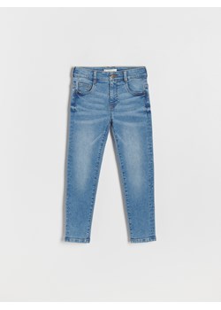 Reserved - Jeansy slim z efektem sprania - niebieski ze sklepu Reserved w kategorii Spodnie chłopięce - zdjęcie 169164480
