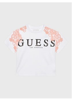 Guess T-Shirt J3GI19 KB7T0 Biały Boxy Fit ze sklepu MODIVO w kategorii Bluzki dziewczęce - zdjęcie 169184962
