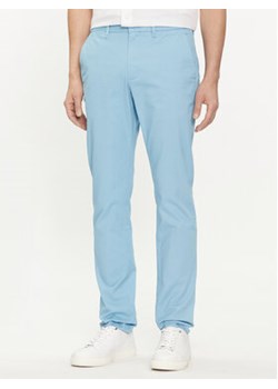 Tommy Hilfiger Chinosy Bleecker MW0MW26619 Niebieski Slim Fit ze sklepu MODIVO w kategorii Spodnie męskie - zdjęcie 169191612