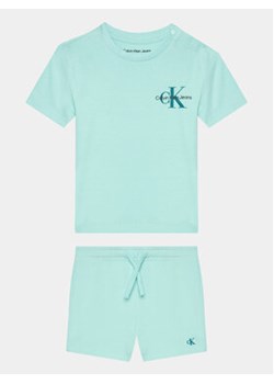 Calvin Klein Jeans Komplet t-shirt i spodenki Monogram Logo IN0IN00176 Niebieski Regular Fit ze sklepu MODIVO w kategorii Komplety niemowlęce - zdjęcie 169204470