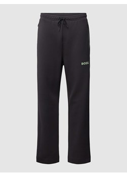 Spodnie dresowe z aplikacją z logo model ‘Hadim’ ze sklepu Peek&Cloppenburg  w kategorii Spodnie męskie - zdjęcie 169216712