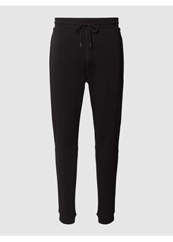 Spodnie dresowe w jednolitym kolorze model ‘Sestart’ ze sklepu Peek&Cloppenburg  w kategorii Spodnie męskie - zdjęcie 169239350