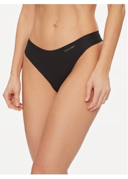 Calvin Klein Underwear Stringi 000QD5103E Czarny ze sklepu MODIVO w kategorii Majtki damskie - zdjęcie 169287571