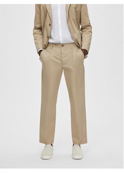 Selected Homme Spodnie materiałowe 16088515 Beżowy Regular Fit ze sklepu MODIVO w kategorii Spodnie męskie - zdjęcie 169288522