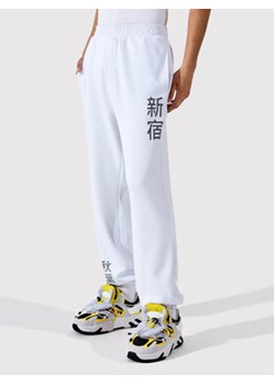 Togoshi Spodnie dresowe TG22-SPM010 Biały Oversize ze sklepu MODIVO w kategorii Spodnie męskie - zdjęcie 169341314