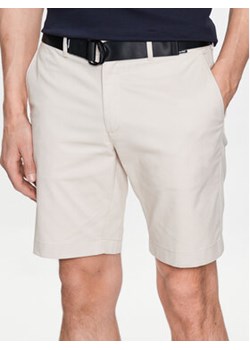 Calvin Klein Szorty materiałowe Modern Twill K10K111788 Beżowy Slim Fit ze sklepu MODIVO w kategorii Spodenki męskie - zdjęcie 169341630
