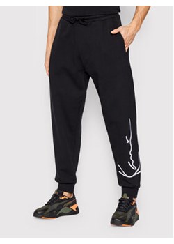 Karl Kani Spodnie dresowe Signature Essential 6004039 Czarny Relaxed Fit ze sklepu MODIVO w kategorii Spodnie męskie - zdjęcie 169423614