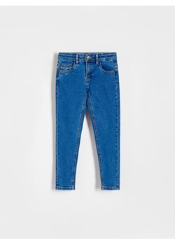 Reserved - Elastyczne jeansy slim - niebieski ze sklepu Reserved w kategorii Spodnie chłopięce - zdjęcie 169424381