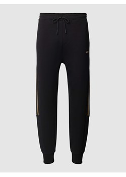 Spodnie dresowe z napisem z logo model ‘Hadikonos’ ze sklepu Peek&Cloppenburg  w kategorii Spodnie męskie - zdjęcie 169443490