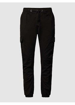 Spodnie sportowe z kieszeniami cargo w jednolitym kolorze ze sklepu Peek&Cloppenburg  w kategorii Spodnie męskie - zdjęcie 169460033
