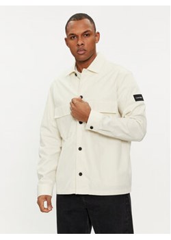 Calvin Klein Koszula K10K109920 Beżowy Regular Fit ze sklepu MODIVO w kategorii Koszule męskie - zdjęcie 169493994