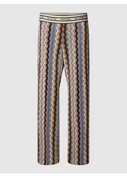 Spodnie materiałowe rozkloszowane ze wzorem na całej powierzchni model ‘FAITH’ ze sklepu Peek&Cloppenburg  w kategorii Spodnie damskie - zdjęcie 169505413