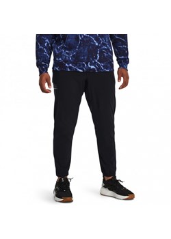 Męskie spodnie treningowe Under Armour Project Rock Unstoppable Pant - czarne ze sklepu Sportstylestory.com w kategorii Spodnie męskie - zdjęcie 169522593