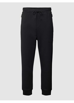 Spodnie dresowe z elastycznym pasem model ‘Hadiko’ ze sklepu Peek&Cloppenburg  w kategorii Spodnie męskie - zdjęcie 169534030