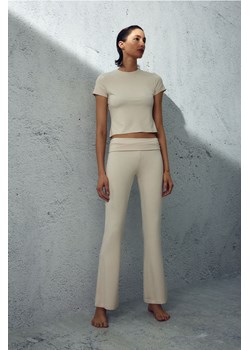 H & M - Rozszerzane spodnie dżersejowe - Beżowy ze sklepu H&M w kategorii Spodnie damskie - zdjęcie 169591591
