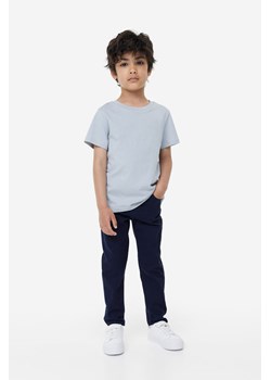 H & M - Spodnie Relaxed Tapered Fit - Niebieski ze sklepu H&M w kategorii Spodnie chłopięce - zdjęcie 169592404