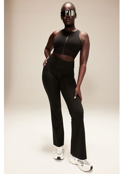 H & M - Rozszerzane legginsy sportowe ShapeMove - Czarny ze sklepu H&M w kategorii Spodnie damskie - zdjęcie 169594232