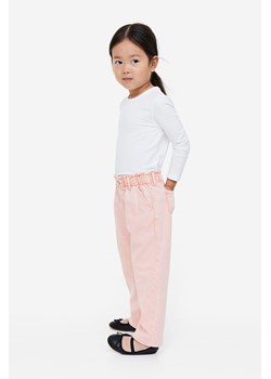 H & M - Dżinsy Relaxed Fit - Różowy ze sklepu H&M w kategorii Spodnie dziewczęce - zdjęcie 169596803