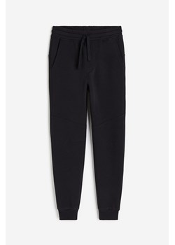 H & M - Joggersy z domieszką bawełny - Czarny ze sklepu H&M w kategorii Spodnie chłopięce - zdjęcie 169598222