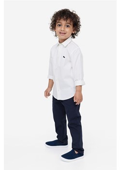 H & M - Spodnie chinos z diagonalu - Niebieski ze sklepu H&M w kategorii Spodnie chłopięce - zdjęcie 169599164