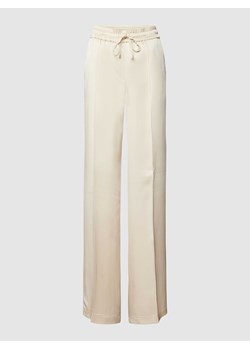 Spodnie materiałowe o rozkloszowanym kroju w kant model ‘AVRIL’ ze sklepu Peek&Cloppenburg  w kategorii Spodnie damskie - zdjęcie 169620371