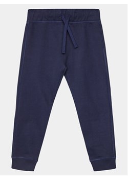 United Colors Of Benetton Spodnie dresowe 3BC1CF04P Granatowy Regular Fit ze sklepu MODIVO w kategorii Spodnie chłopięce - zdjęcie 169634850