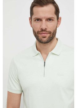 Calvin Klein polo bawełniane kolor beżowy gładki ze sklepu ANSWEAR.com w kategorii T-shirty męskie - zdjęcie 169637921