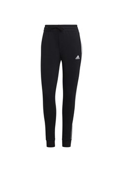 Spodnie dresowe damskie Essentials 3-Stripes Fleece Adidas ze sklepu SPORT-SHOP.pl w kategorii Spodnie damskie - zdjęcie 169638724