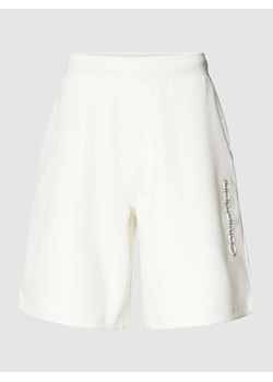 Szorty z dzianiny dresowej o kroju regular fit w jednolitym kolorze ze sklepu Peek&Cloppenburg  w kategorii Spodenki męskie - zdjęcie 169652624