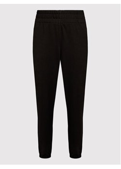 DKNY Sport Spodnie dresowe DPPP2982 Czarny Regular Fit ze sklepu MODIVO w kategorii Spodnie damskie - zdjęcie 169655022