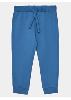 United Colors Of Benetton Spodnie dresowe 3BC1GF01P Niebieski Regular Fit ze sklepu MODIVO w kategorii Spodnie chłopięce - zdjęcie 169657920