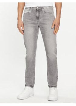 Calvin Klein Jeans Jeansy J30J324833 Szary Slim Fit ze sklepu MODIVO w kategorii Jeansy męskie - zdjęcie 169658071