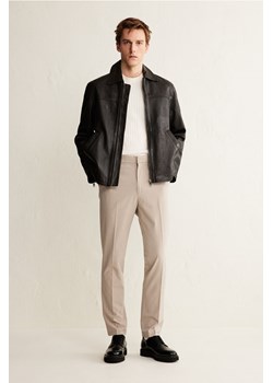 H & M - Spodnie Slim Fit - Brązowy ze sklepu H&M w kategorii Spodnie męskie - zdjęcie 169677043